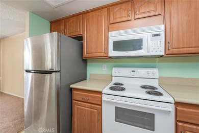 Welcome to this bright and inviting Villa Nueva model nestled in on Leisure Village Par 3 Golf Course in California - for sale on GolfHomes.com, golf home, golf lot