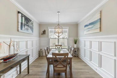 This like new, charming residence, built in 2023 by Bill Clark on Compass Pointe Golf Course in North Carolina - for sale on GolfHomes.com, golf home, golf lot