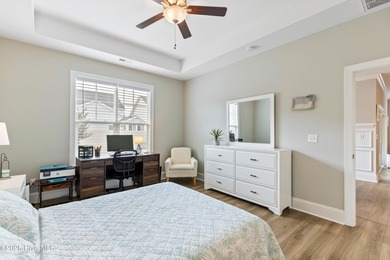 This like new, charming residence, built in 2023 by Bill Clark on Compass Pointe Golf Course in North Carolina - for sale on GolfHomes.com, golf home, golf lot