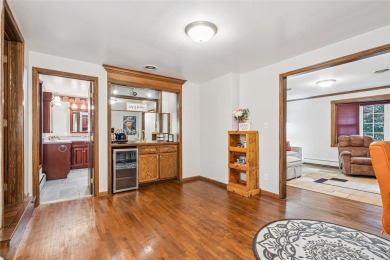 Welcome to this spacious and beautifully maintained 3-bedroom, 1 on Ottumwa Country Club in Iowa - for sale on GolfHomes.com, golf home, golf lot