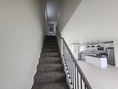 Brand new construction. Located in Hidden Bridge Ranch across on Hidden Bridge Golf Club in Wyoming - for sale on GolfHomes.com, golf home, golf lot