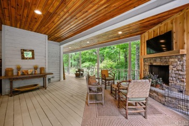 Discover the idyllic mountain charm of this four-bedroom on Sapphire National Golf Club in North Carolina - for sale on GolfHomes.com, golf home, golf lot