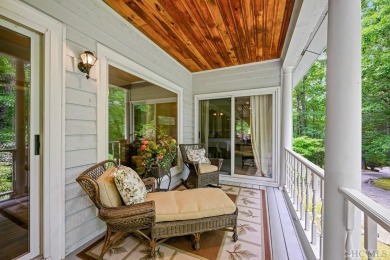 Discover the idyllic mountain charm of this four-bedroom on Sapphire National Golf Club in North Carolina - for sale on GolfHomes.com, golf home, golf lot