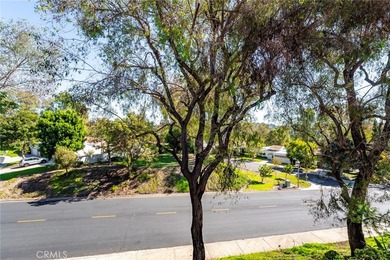 Welcome to this bright and inviting Villa Nueva model nestled in on Leisure Village Par 3 Golf Course in California - for sale on GolfHomes.com, golf home, golf lot