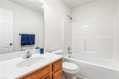 Fully updated in 2025 from top to bottom, this stunning 3BR/2BA on Lake Louise Golf Club in North Carolina - for sale on GolfHomes.com, golf home, golf lot