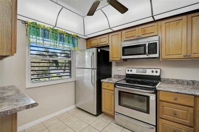 Stunning 2-Bedroom, 2-Bath Condo with Scenic Lake Views in The on The Meadows Golf and Country Club in Florida - for sale on GolfHomes.com, golf home, golf lot