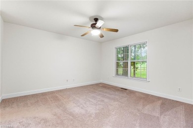 Fully updated in 2025 from top to bottom, this stunning 3BR/2BA on Lake Louise Golf Club in North Carolina - for sale on GolfHomes.com, golf home, golf lot