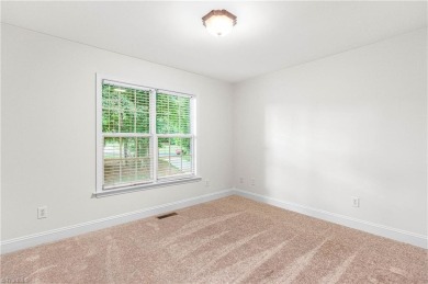 Fully updated in 2025 from top to bottom, this stunning 3BR/2BA on Lake Louise Golf Club in North Carolina - for sale on GolfHomes.com, golf home, golf lot