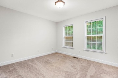 Fully updated in 2025 from top to bottom, this stunning 3BR/2BA on Lake Louise Golf Club in North Carolina - for sale on GolfHomes.com, golf home, golf lot