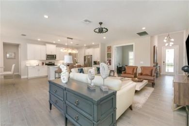 Luxurious Living with Golf Course Views in Royal Palm Golf on Eagle Lakes Golf Club in Florida - for sale on GolfHomes.com, golf home, golf lot