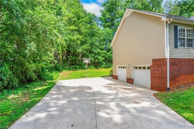 Fully updated in 2025 from top to bottom, this stunning 3BR/2BA on Lake Louise Golf Club in North Carolina - for sale on GolfHomes.com, golf home, golf lot