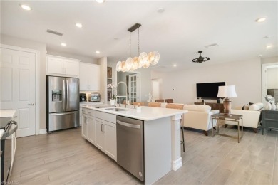 Luxurious Living with Golf Course Views in Royal Palm Golf on Eagle Lakes Golf Club in Florida - for sale on GolfHomes.com, golf home, golf lot