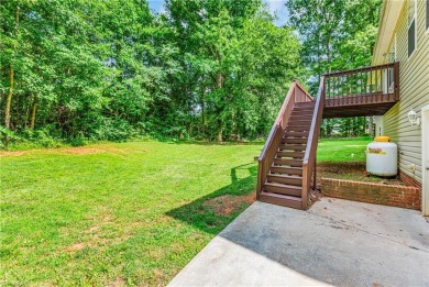 Fully updated in 2025 from top to bottom, this stunning 3BR/2BA on Lake Louise Golf Club in North Carolina - for sale on GolfHomes.com, golf home, golf lot