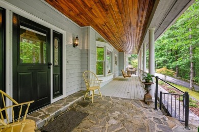 Discover the idyllic mountain charm of this four-bedroom on Sapphire National Golf Club in North Carolina - for sale on GolfHomes.com, golf home, golf lot