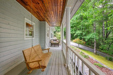 Discover the idyllic mountain charm of this four-bedroom on Sapphire National Golf Club in North Carolina - for sale on GolfHomes.com, golf home, golf lot