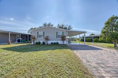 Under contract-accepting backup offers. Welcome to this on Lemon Bay Golf Club in Florida - for sale on GolfHomes.com, golf home, golf lot