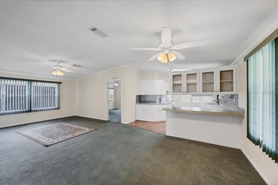 Under contract-accepting backup offers. Welcome to this on Lemon Bay Golf Club in Florida - for sale on GolfHomes.com, golf home, golf lot