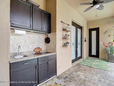 Stunning 3 bedrooms + office, 3 bath + 3 car garage Cabana Pool on Southern Woods Golf Club in Florida - for sale on GolfHomes.com, golf home, golf lot