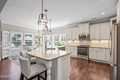 Welcome to life at Olde Point- where mornings start with coffee on Olde Point Golf and Country Club in North Carolina - for sale on GolfHomes.com, golf home, golf lot