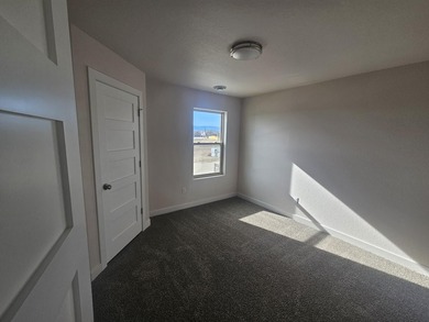 Brand new construction. Located in Hidden Bridge Ranch across on Hidden Bridge Golf Club in Wyoming - for sale on GolfHomes.com, golf home, golf lot