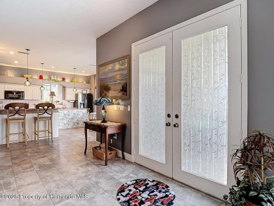 Stunning 3 bedrooms + office, 3 bath + 3 car garage Cabana Pool on Southern Woods Golf Club in Florida - for sale on GolfHomes.com, golf home, golf lot