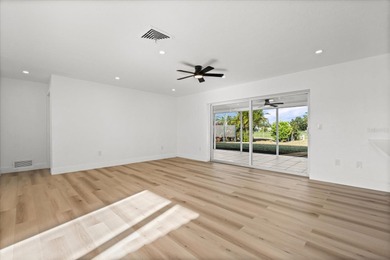 BRAND NEW VINYL PRIVACY FENCE JUST INSTALLED IN BACK YARD! THIS on Village Green Golf Club of Sarasota in Florida - for sale on GolfHomes.com, golf home, golf lot