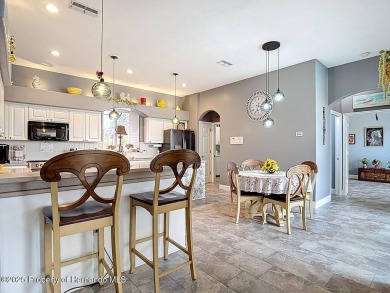 Stunning 3 bedrooms + office, 3 bath + 3 car garage Cabana Pool on Southern Woods Golf Club in Florida - for sale on GolfHomes.com, golf home, golf lot