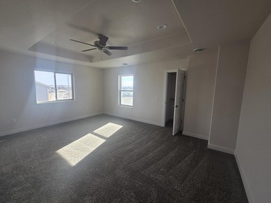 Brand new construction. Located in Hidden Bridge Ranch across on Hidden Bridge Golf Club in Wyoming - for sale on GolfHomes.com, golf home, golf lot