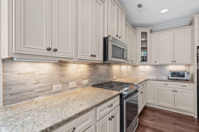 Welcome to life at Olde Point- where mornings start with coffee on Olde Point Golf and Country Club in North Carolina - for sale on GolfHomes.com, golf home, golf lot