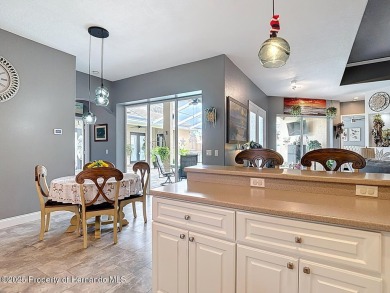 Stunning 3 bedrooms + office, 3 bath + 3 car garage Cabana Pool on Southern Woods Golf Club in Florida - for sale on GolfHomes.com, golf home, golf lot