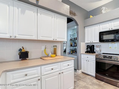 Stunning 3 bedrooms + office, 3 bath + 3 car garage Cabana Pool on Southern Woods Golf Club in Florida - for sale on GolfHomes.com, golf home, golf lot