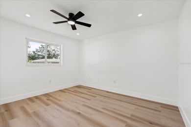 BRAND NEW VINYL PRIVACY FENCE JUST INSTALLED IN BACK YARD! THIS on Village Green Golf Club of Sarasota in Florida - for sale on GolfHomes.com, golf home, golf lot