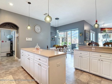 Stunning 3 bedrooms + office, 3 bath + 3 car garage Cabana Pool on Southern Woods Golf Club in Florida - for sale on GolfHomes.com, golf home, golf lot