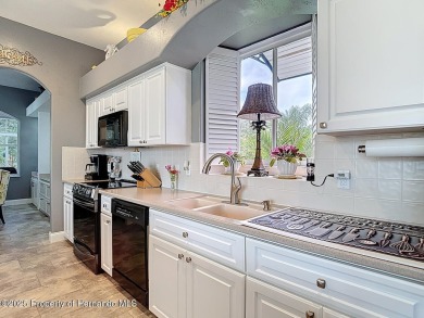 Stunning 3 bedrooms + office, 3 bath + 3 car garage Cabana Pool on Southern Woods Golf Club in Florida - for sale on GolfHomes.com, golf home, golf lot