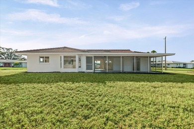 BRAND NEW VINYL PRIVACY FENCE JUST INSTALLED IN BACK YARD! THIS on Village Green Golf Club of Sarasota in Florida - for sale on GolfHomes.com, golf home, golf lot