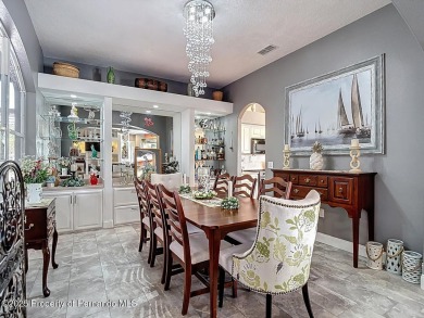 Stunning 3 bedrooms + office, 3 bath + 3 car garage Cabana Pool on Southern Woods Golf Club in Florida - for sale on GolfHomes.com, golf home, golf lot