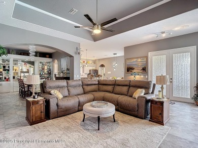 Stunning 3 bedrooms + office, 3 bath + 3 car garage Cabana Pool on Southern Woods Golf Club in Florida - for sale on GolfHomes.com, golf home, golf lot