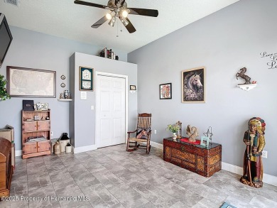 Stunning 3 bedrooms + office, 3 bath + 3 car garage Cabana Pool on Southern Woods Golf Club in Florida - for sale on GolfHomes.com, golf home, golf lot