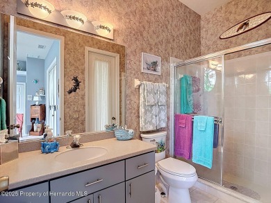 Stunning 3 bedrooms + office, 3 bath + 3 car garage Cabana Pool on Southern Woods Golf Club in Florida - for sale on GolfHomes.com, golf home, golf lot