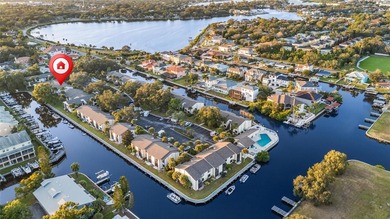 Waterfront Living. Gulf Access. Sunsets from Your Balcony. This on Tarpon Springs Golf Course in Florida - for sale on GolfHomes.com, golf home, golf lot