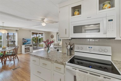 This 1983 Jacobsen Imperial home is situated on a perimeter lot on Maple Leaf Golf and Country Club in Florida - for sale on GolfHomes.com, golf home, golf lot