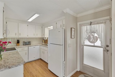 This 1983 Jacobsen Imperial home is situated on a perimeter lot on Maple Leaf Golf and Country Club in Florida - for sale on GolfHomes.com, golf home, golf lot
