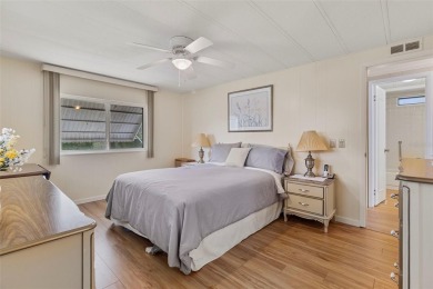 This 1983 Jacobsen Imperial home is situated on a perimeter lot on Maple Leaf Golf and Country Club in Florida - for sale on GolfHomes.com, golf home, golf lot