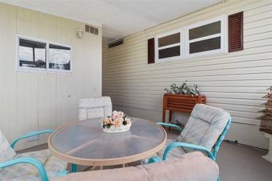 This 1983 Jacobsen Imperial home is situated on a perimeter lot on Maple Leaf Golf and Country Club in Florida - for sale on GolfHomes.com, golf home, golf lot