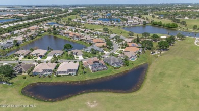 Welcome to your dream home! Nestled on a prestigious Viera East on Viera East Golf Club in Florida - for sale on GolfHomes.com, golf home, golf lot