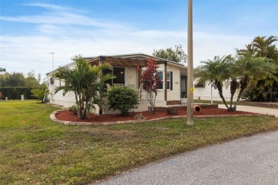 This 1983 Jacobsen Imperial home is situated on a perimeter lot on Maple Leaf Golf and Country Club in Florida - for sale on GolfHomes.com, golf home, golf lot
