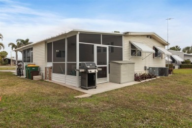 This 1983 Jacobsen Imperial home is situated on a perimeter lot on Maple Leaf Golf and Country Club in Florida - for sale on GolfHomes.com, golf home, golf lot