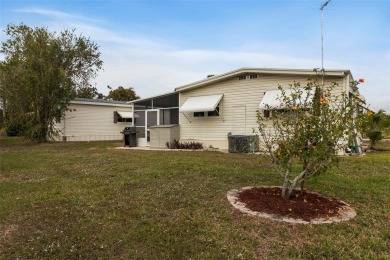 This 1983 Jacobsen Imperial home is situated on a perimeter lot on Maple Leaf Golf and Country Club in Florida - for sale on GolfHomes.com, golf home, golf lot