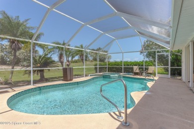 Welcome to your dream home! Nestled on a prestigious Viera East on Viera East Golf Club in Florida - for sale on GolfHomes.com, golf home, golf lot