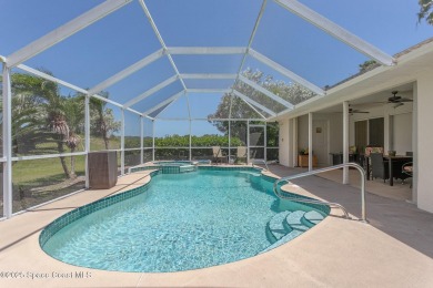 Welcome to your dream home! Nestled on a prestigious Viera East on Viera East Golf Club in Florida - for sale on GolfHomes.com, golf home, golf lot